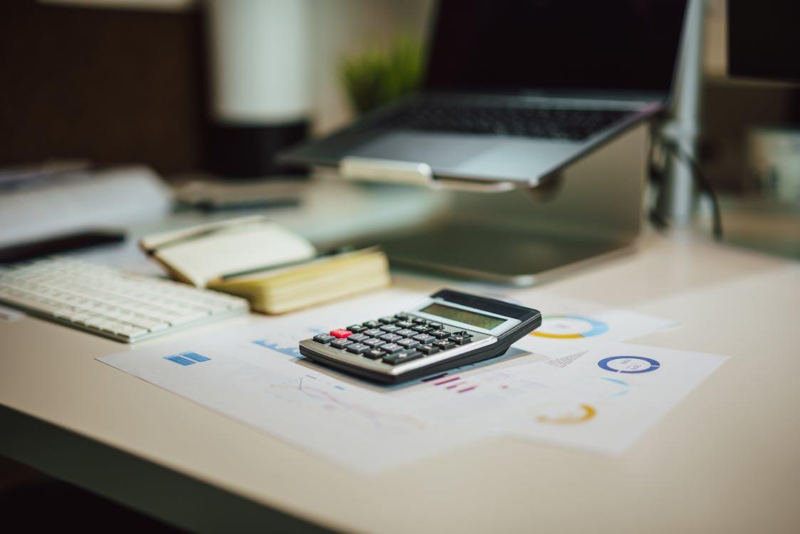 A Calculator on a Desk · Free Stock Photo